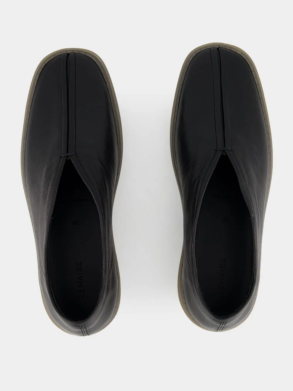 Black Low-Top Linoleum Piped Leather Sneakers