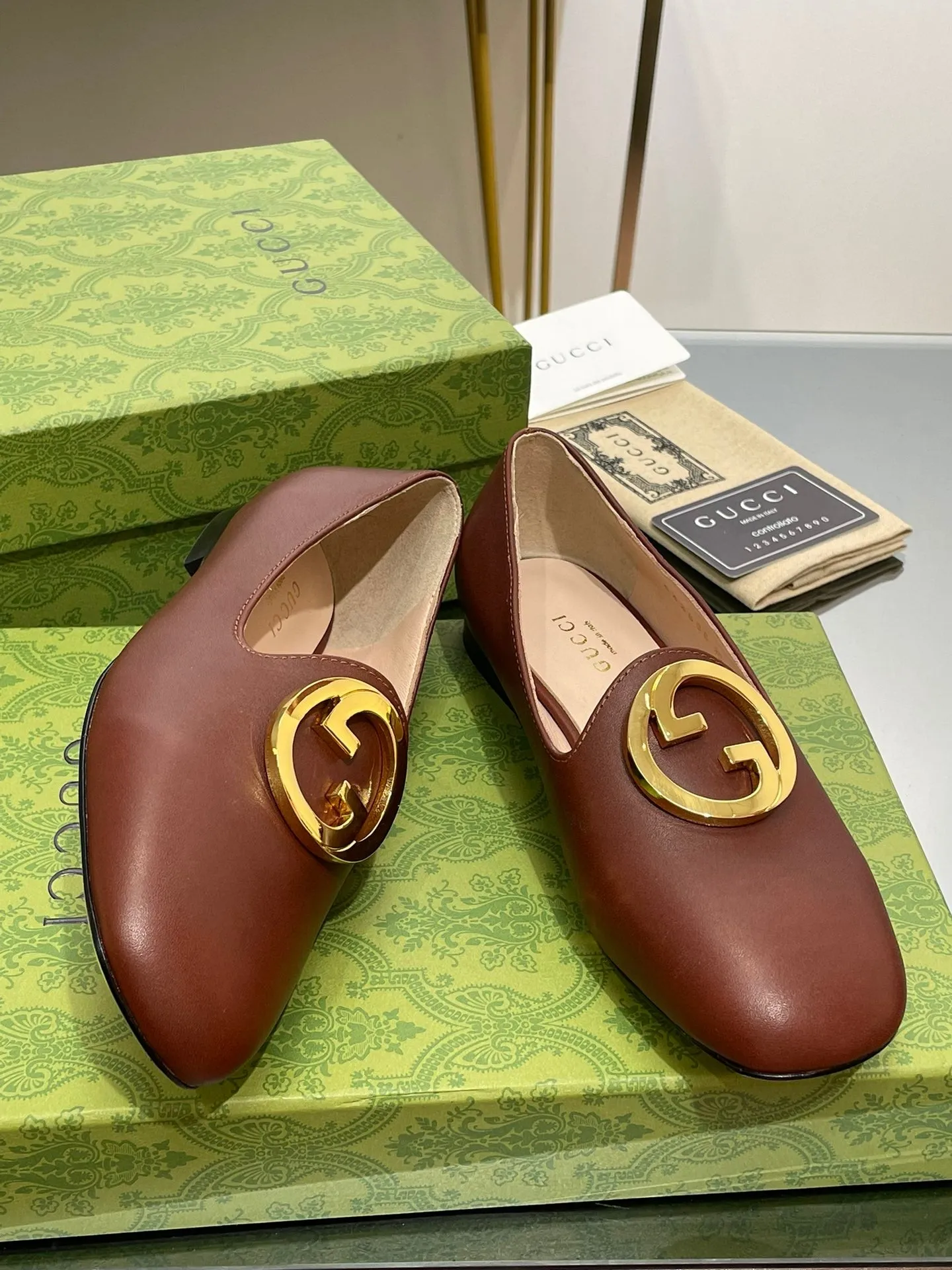 BLONDIE LOGO-PLAQUE LOAFERS IN SYRUP BROWN CALFSKIN