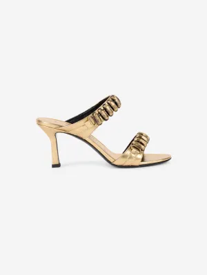 mules en cuir metallisé or